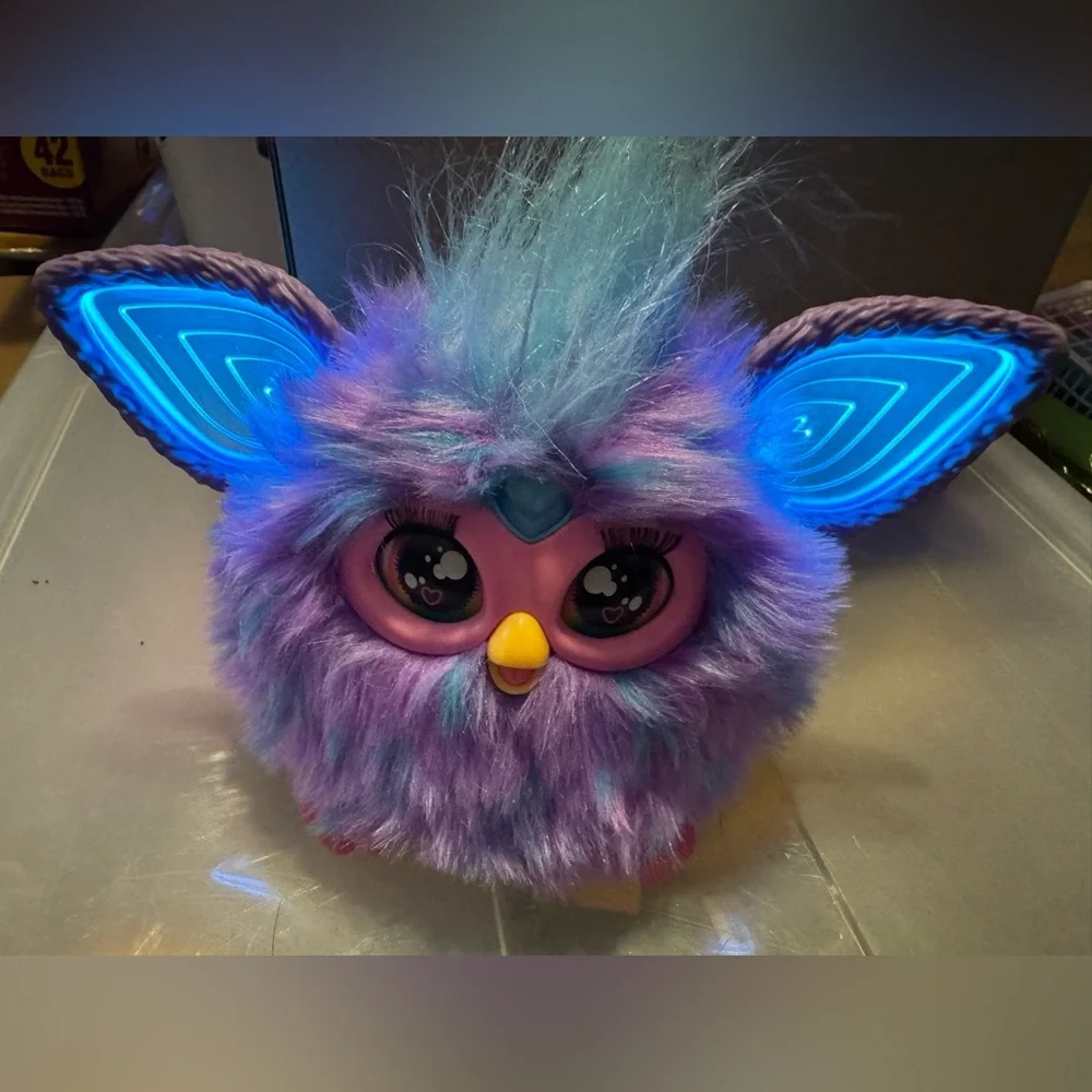 Purple tie dye furby Like new condition interactive, talks lights up & moves